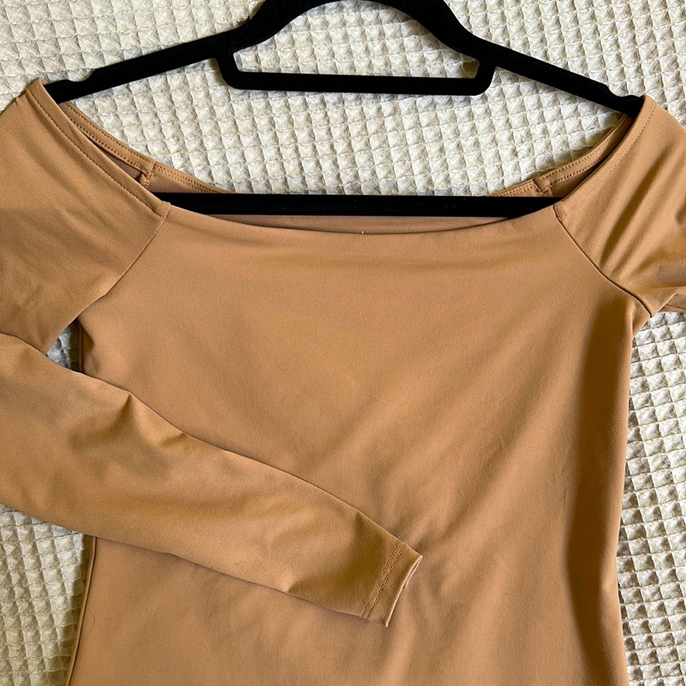 Nuuds off the shoulder bodysuit. Brand new never worn. Size Small $45